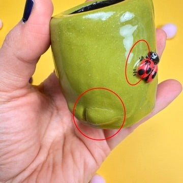 Miniature candle holder with a minor defect “Frog with a little butt and a ladybug”