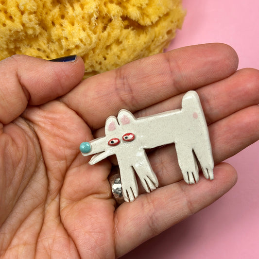 Ceramic brooch "White Dog"